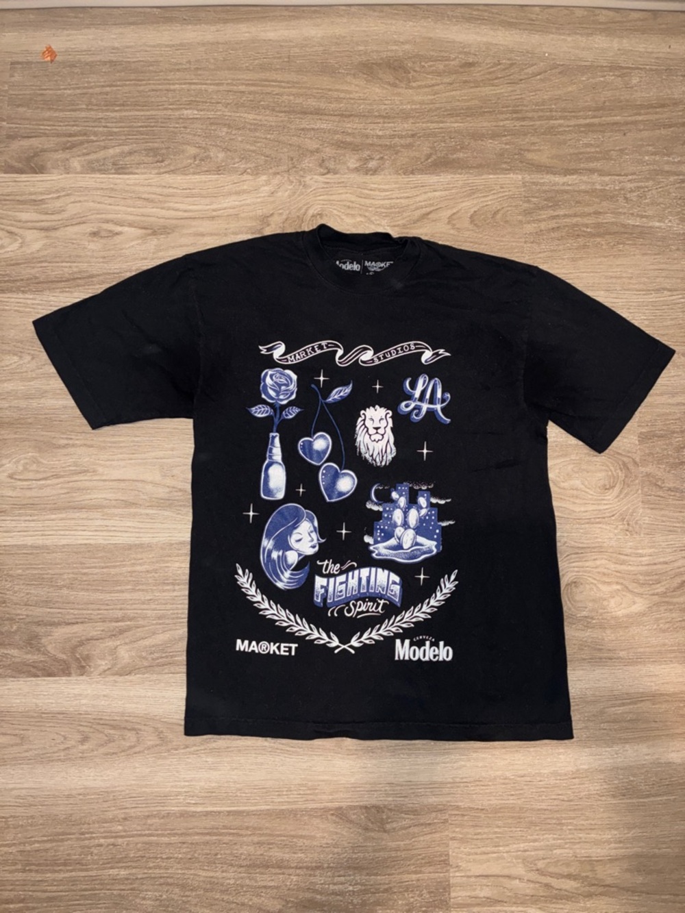 Market Studios x Modelo “The Fighting Spirit” Graphic Tee – Men’s Medium